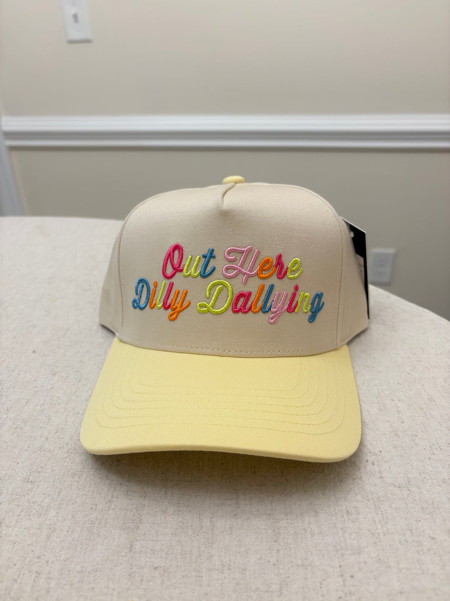 Buttercream dilly dallying trucker hat